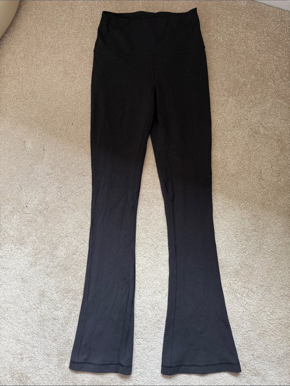 lululemon athletica Black flare Leggings with Logo Tag
